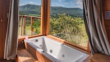 Chalé superluxo | 1 quarto, frigobar, Wi-Fi de cortesia, roupa de cama
