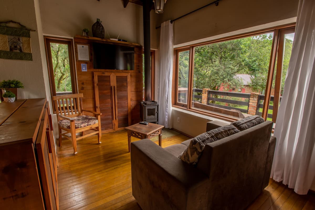 Chalet Familial | Coin séjour | TV connectée, services de streaming