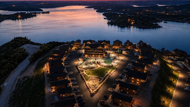 A resort with a central courtyard, connected buildings, and a lake view. - Hot Tub, Lake & Mtn Views, King Beds, Bunk Room (Kimberling City)