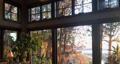 Hand made lodge in Arkansas on a bluff over the River