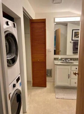 Hair dryer, towels, soap, shampoo