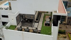 A rooftop terrace with outdoor seating and a pool. - Elite Signature (Nairobi)