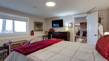 1 bedroom, desk, iron/ironing board, travel crib