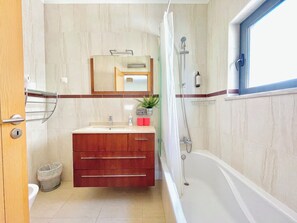 Hair dryer, towels, soap, shampoo
