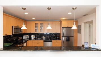 Condo | Private kitchen | Full-size fridge, microwave, oven, stovetop