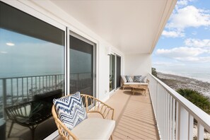 Terrace/patio - Oceanfront Oasis. Expansive balcony, cozy decor, stunning views over the dunes. (Fort Walton Beach)