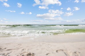 On the beach, sun loungers, beach towels