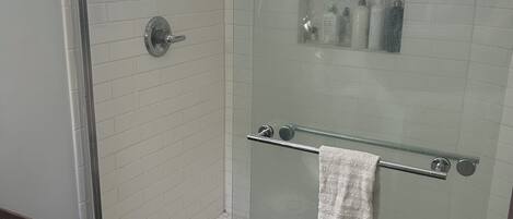 Shower, towels, soap, shampoo