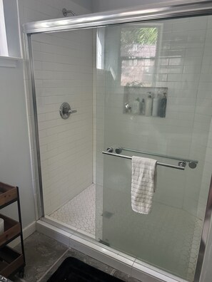 Shower, towels, soap, shampoo