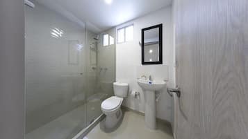 Rainfall showerhead, towels, soap, shampoo