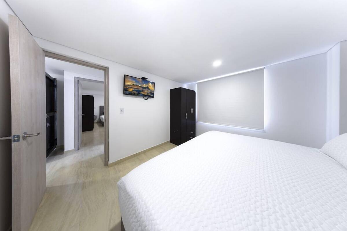Down comforters, pillowtop beds, desk, WiFi (free)