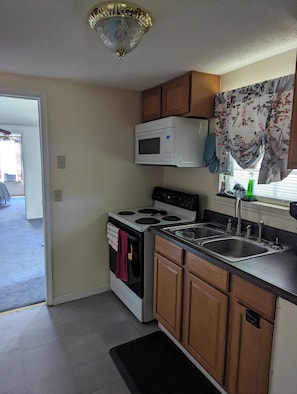 Fridge, microwave, oven, stovetop - At Ease Hidden Treasure (Troy)