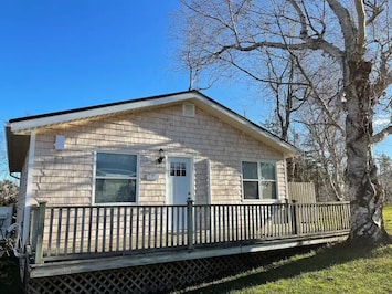 Spacious deck with bbq and fire table