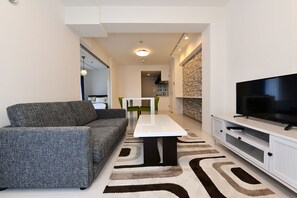 Family Suite | Living area | LCD TV