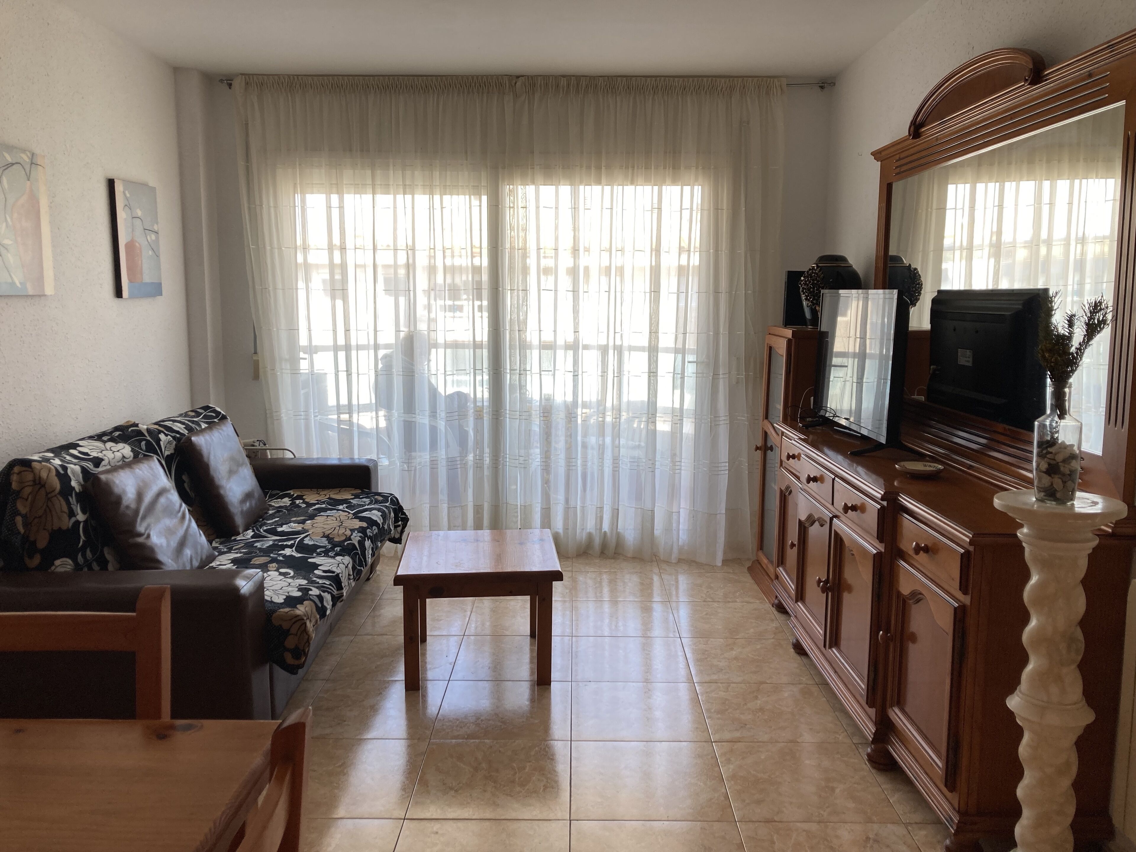 Seafront apartment with balcony