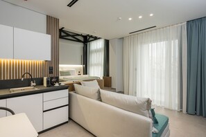 Living area - Ostrakon Suites (Agia Marina)