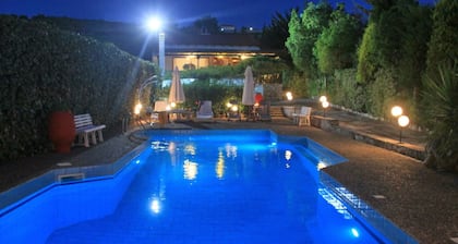 Private property with outdoor pool , cosy spaces and beautiful garden