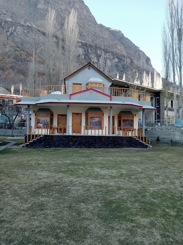 Mountain view with big garden and beautiful view of apricots  cherry, treesand .