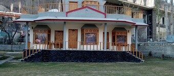 Mountain view with big garden and beautiful view of apricots  cherry, treesand .