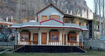 Mountain view with big garden and beautiful view of apricots cherry, treesand .