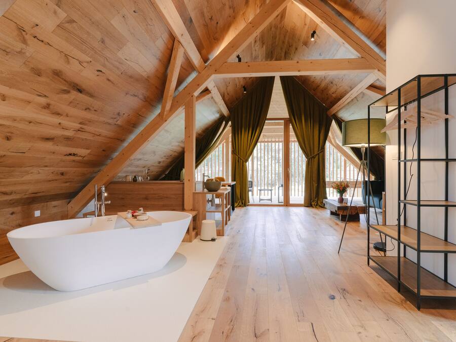 Deluxe Studio Suite | Living area | 50-inch Smart TV with digital channels, TV, heated floors