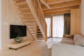 ซูพีเรียวิลล่า | ห้องนั่งเล่น | สมาร์ททีวี 50 นิ้ว พร้อมช่องดิจิตอล, ทีวี, พื้นอุ่น