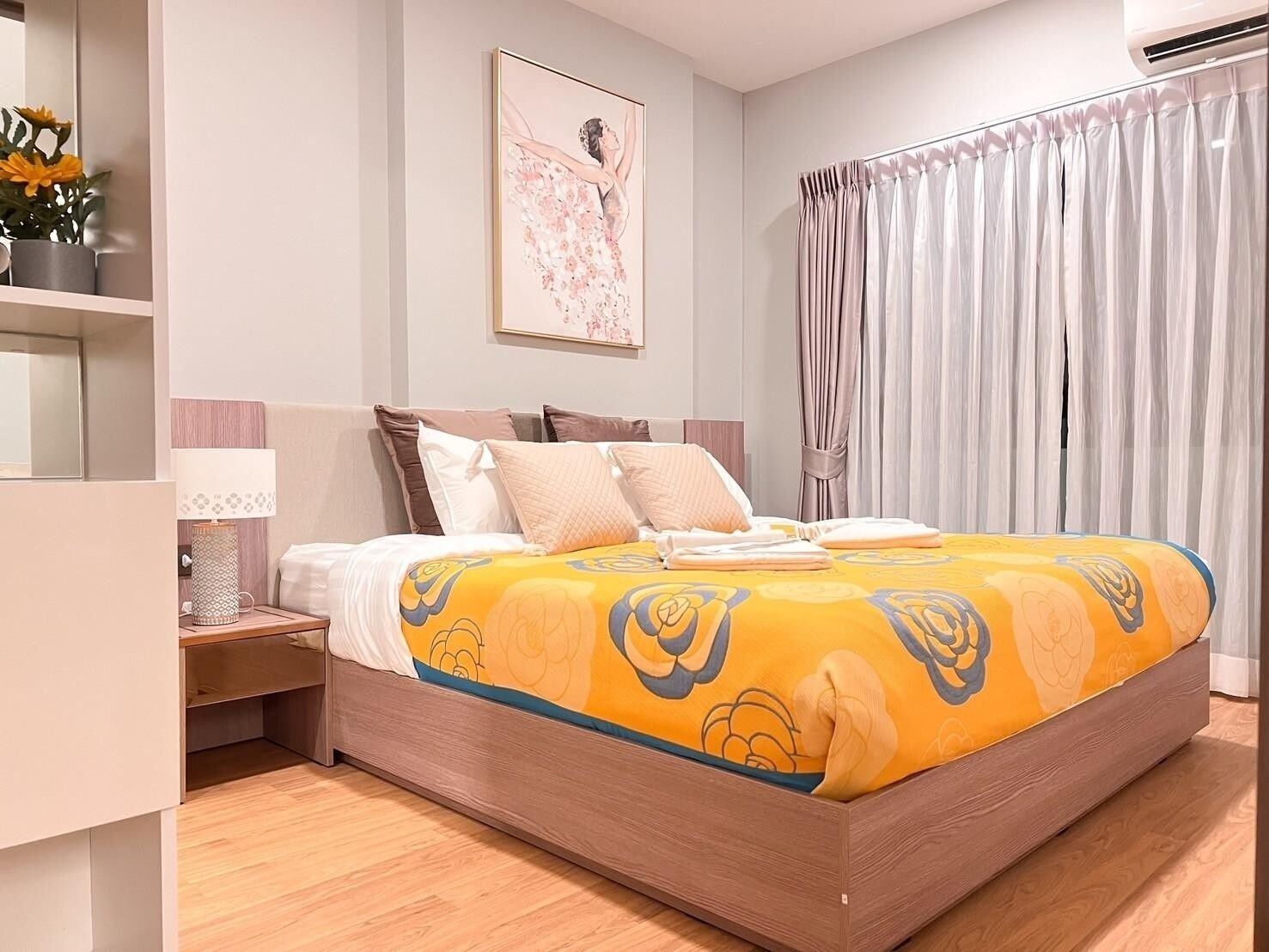 Deluxe Condo, 2 Bedrooms, Balcony, City View | Premium bedding, individually decorated, desk, blackout drapes