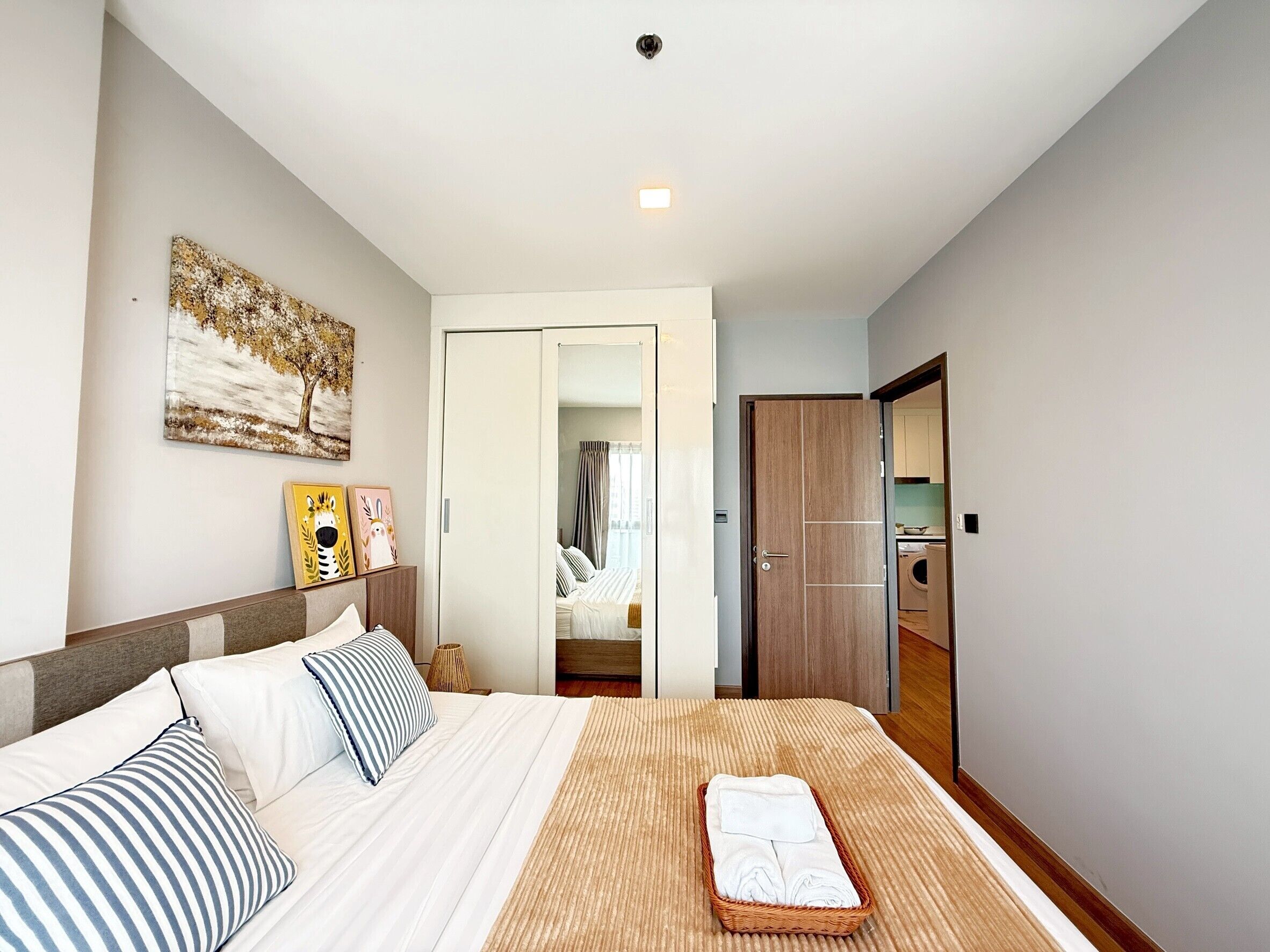 Deluxe Condo, 2 Bedrooms, Balcony, City View | Premium bedding, individually decorated, desk, blackout drapes