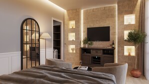 A modern bedroom with a large bed, a TV mounted on a stone wall, and a potted plant. - Salento Winery Lodge - Your Wellness Oasis in Salento (San Pietro In Bevagna)