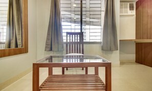 Desk, iron/ironing board, bed sheets - Itsy Hotels Cruz Royale Santacruz West (Mumbai)