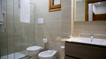 Hair dryer, bathrobes, slippers, towels