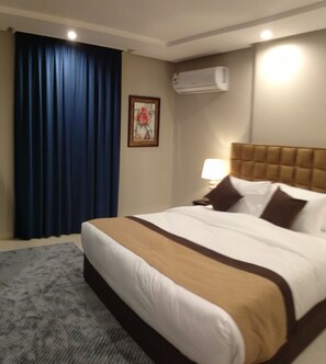 Egyptian cotton sheets, premium bedding, pillow-top beds, in-room safe - Yan Apartments Hotel  (Jeddah)