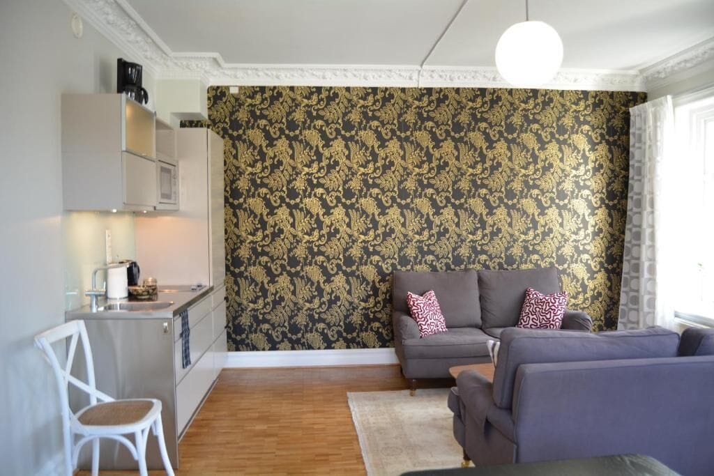 Classic Apartment | Living area | 55-inch Smart TV with cable channels, Netflix, streaming services