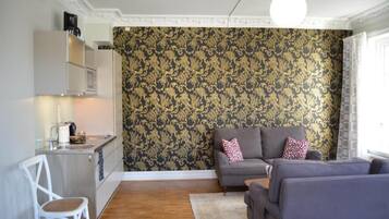 經典公寓 | 起居區 | 55-吋智慧型電視、有線頻道、Netflix、串流服務