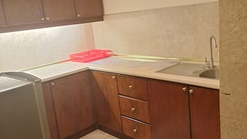 Apartemen Keluarga | Dapur pribadi | Lemari es dan microwave