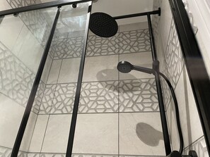 Shower, hair dryer, towels, soap