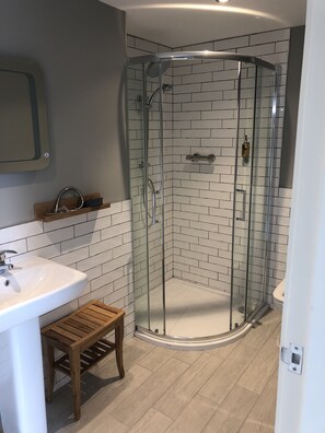 Shower, rainfall showerhead, towels