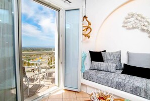 Apartamento, 1 cama Queen | Área de estar