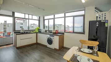Studio, 1 Double Bed, Balcony, City View | Private kitchen | Fridge, microwave, electric kettle, cookware/dishes/utensils
