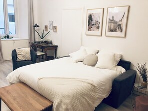 1 bedroom, desk, iron/ironing board, travel crib