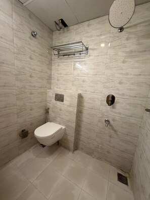 Shower, rainfall showerhead, towels
