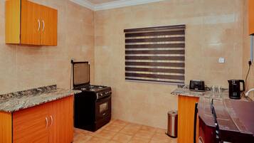 Comfort Apartment | Private kitchen | Mini-fridge, oven, stovetop, toaster