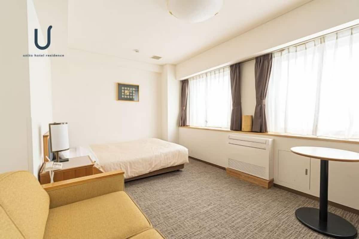 In-room safe, desk, laptop workspace, blackout curtains