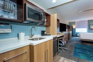 Desk, blackout drapes, iron/ironing board, bed sheets