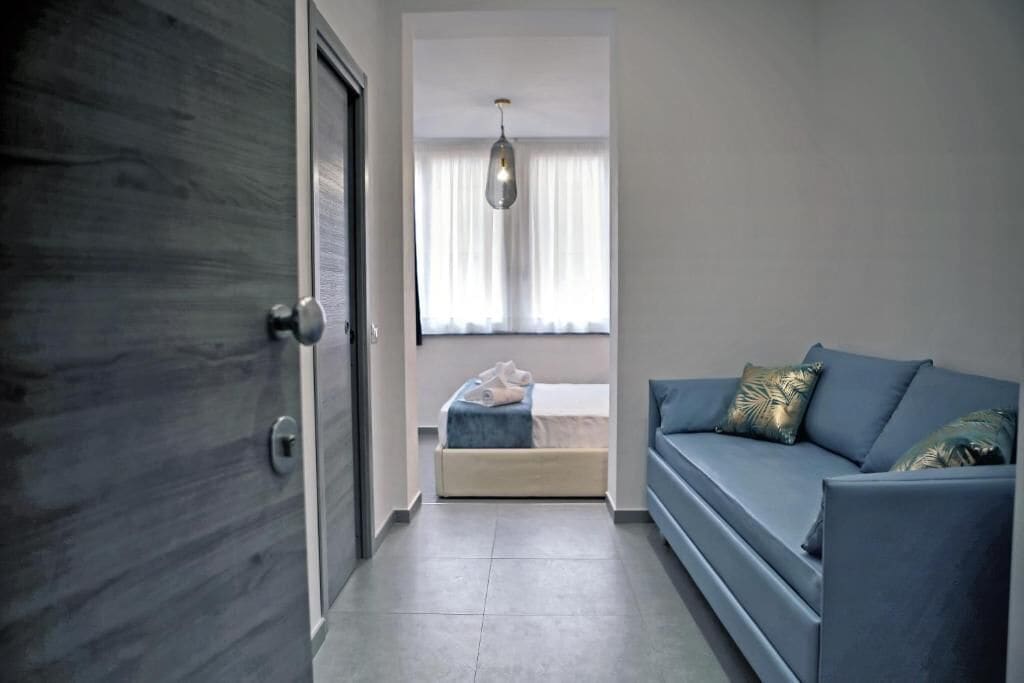 Comfort Triple Room, City View (6) | In-room safe, blackout drapes, soundproofing, iron/ironing board