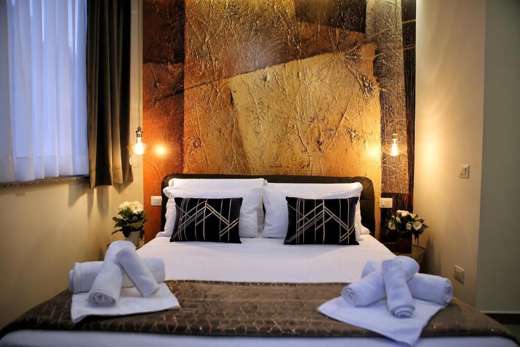 Deluxe Triple Room, City View (5) | In-room safe, blackout drapes, iron/ironing board, free WiFi