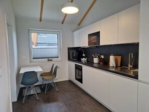 Fridge, microwave, dishwasher, coffee/tea maker