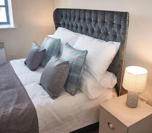 1 bedroom, desk, iron/ironing board, travel crib