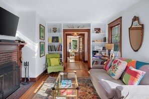 TV, fireplace, books, offices