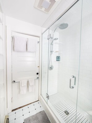 Bathtub, hair dryer, towels